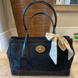 Mid size black Coach bag